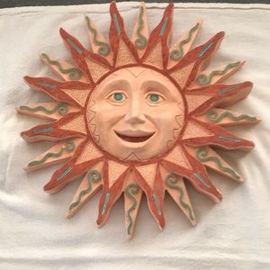 Terracotta sun and moon